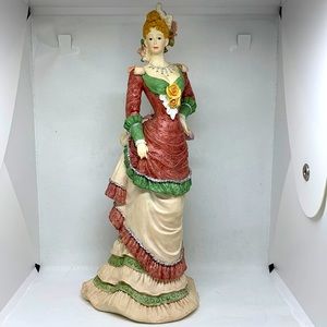 Victorian Elegant Lady in fancy dress with bustle and frills, roses, blonde